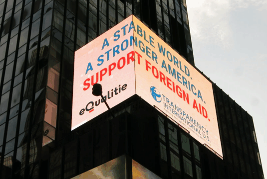 Times Square Ad Warns of Economic Fallout as Foreign Aid Cuts Deepen